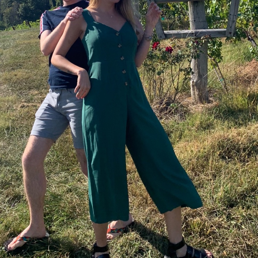 Green francesca’s sleeveless jumpsuit with buttons